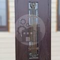 модель ДВНТР-56 со стеклом и ковкой, фото реальной установленной двери