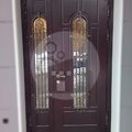 двустворчатая дверь в частный дом, с отделкой МДФ, стекло и ковка